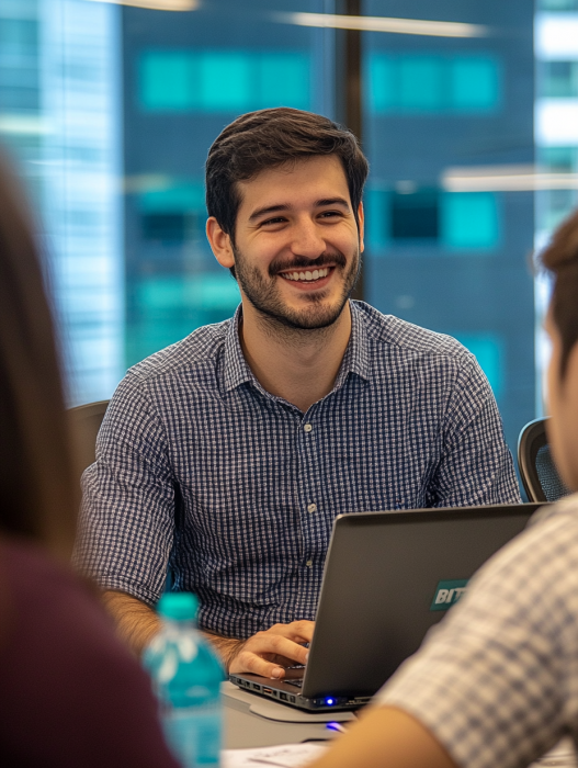 dsmith1026_photograph_of_a_meeting_in_an_busy_techy_office_of_408fb391-72eb-4e2d-98e1-1e66600be46c_2